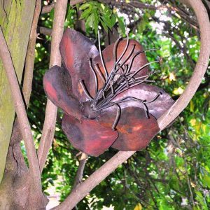 Steel flower sculpture in wisteria